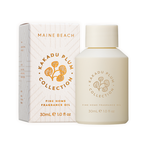 A 30ml bottle of Kakadu Plum fragrance oil by MAINE BEACH, Fine Home Fragrance Oil, with its packaging box.
