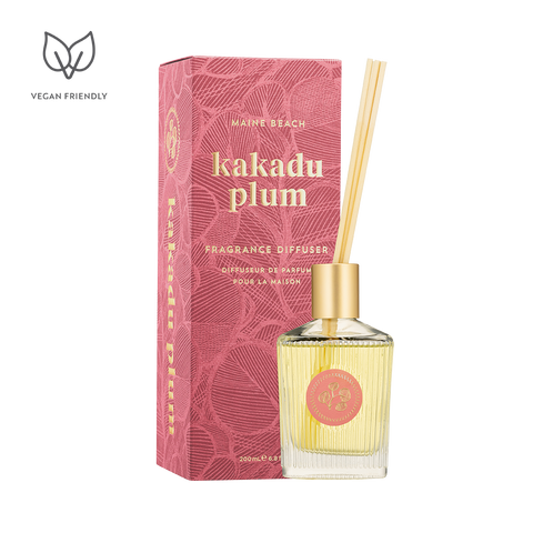 Fragrance diffuser with pink packaging labeled 'kakadu plum' on a white background